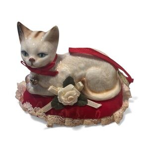 Kurt Adler Vintage Cream Cat Ornament on red satin pillow from 1989